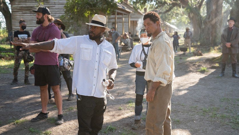 Antoine Fuqua (left) directs Will Smith in "Emancipation." The filmmaker will take the reins of a Michael Jackson biopic, "Michael," which begins shooting this year with the singer's nephew, Jaafar Jackson, in the title role.