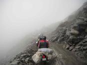 Struggling against the wet, sticky mud on a nonexistent road.