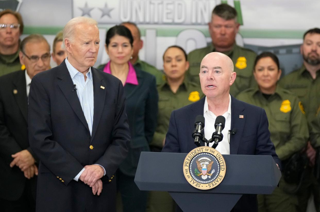 President Joe Biden listens to Secretary of Homeland Security Alejandro Mayorkas speak at the Border Patrol station in Brownsville on Feb. 29.