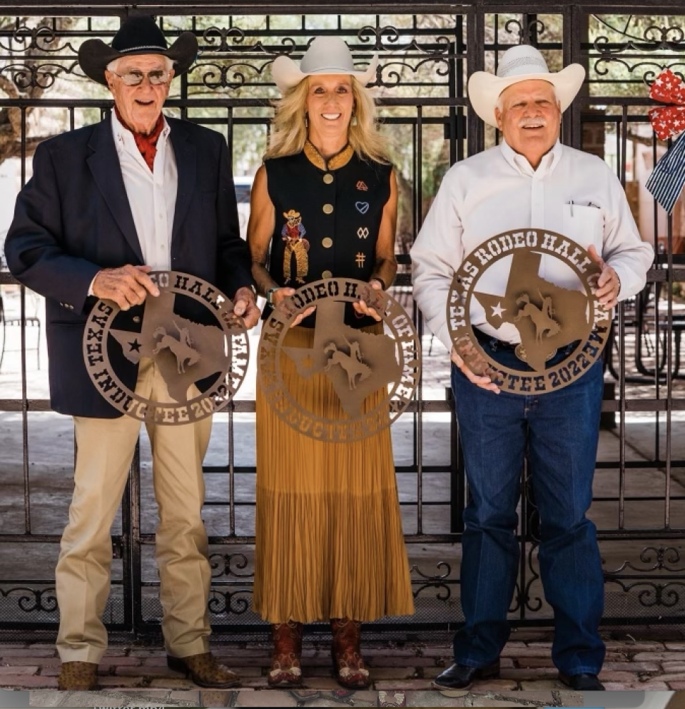 Angela Ganter (middle) poses after being inducted into the Texas Rodeo Hall of Fame on June 24.