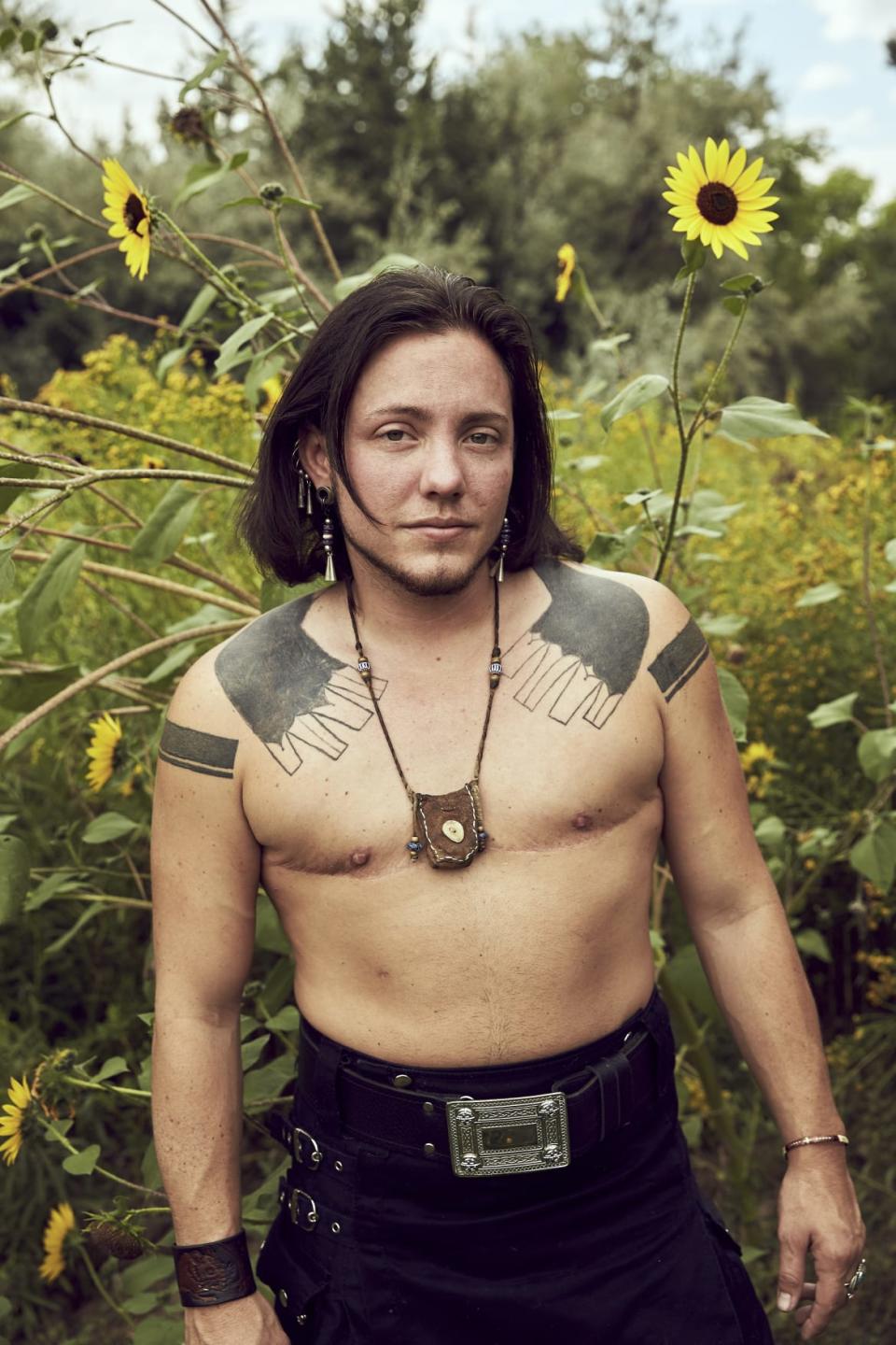 <div class="inline-image__caption"><p>Aodhàn identifies as a trans man and also as “Two Spirit” within the Native American culture and comes from the Cherokee. He taught me that before colonization there was no labels for gender non-conforming indigenous people. </p><p>The term “Two Spirit” is an umbrella term for all the different words (120+ documented words), each tribe came up with when colonists asked, “What are they?”. Aodhàn believes that within Cherokee tribe “Two Spirit” means “It’s not about me” and his role is to help the people.</p><p>Often a two spirit person would take a vital role within the community because they where allowed to blend both the masculine and feminine roles in life, ceremony and art that are usually separate. He put it so beautifully. “Women are the moon and men are the sun, so the moon is feminine and the sun is masculine. The two spirit people are the sunrise and the sunset that brings these two together”. I love that.</p></div> <div class="inline-image__credit">Soraya Zaman</div>