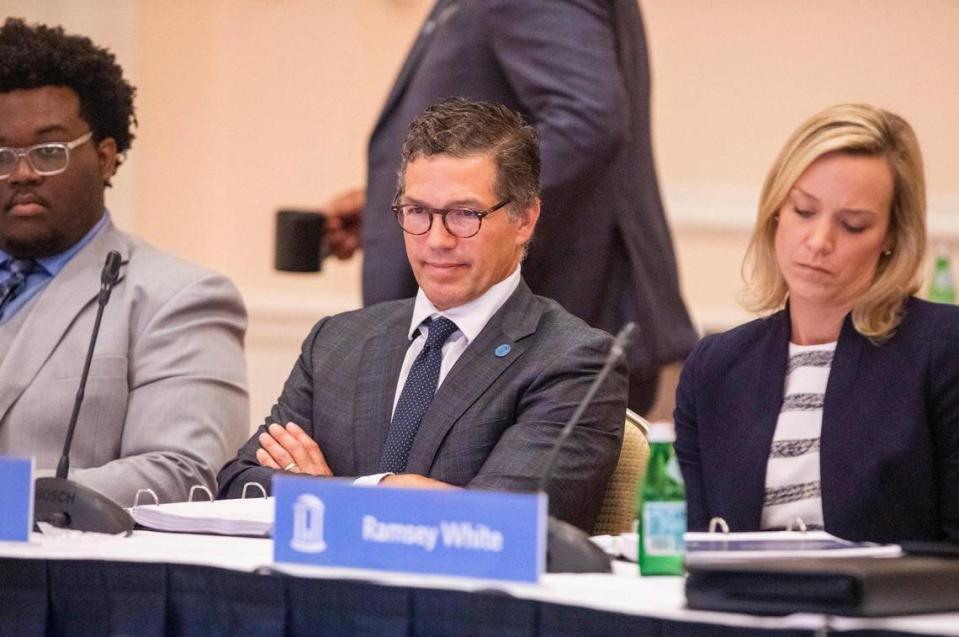 Perrin Jones listens to fellow trustees speak during his first meeting as a member of the UNC Board of Trustees, at the Carolina Inn, on Thursday, July 15, 2021, in Chapel Hill, N.C.