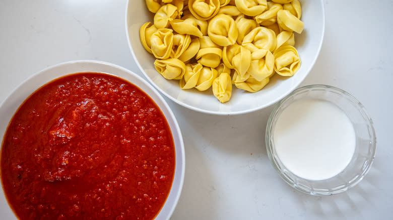 ingredients for creamy tortellini with tomato sauce