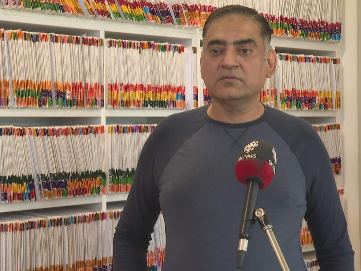 'I consider myself fairly resilient, but I can see that it is a bit overwhelming,' said Dr. Syed Naqvi of Summerside, who has been working 14-hour days as well as weekends.  (Laura Meader/CBC - image credit)