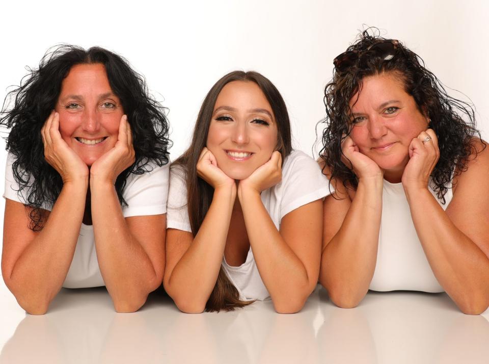 Jamie LeRose with her mothers, both of whom were musicians like their daughter.