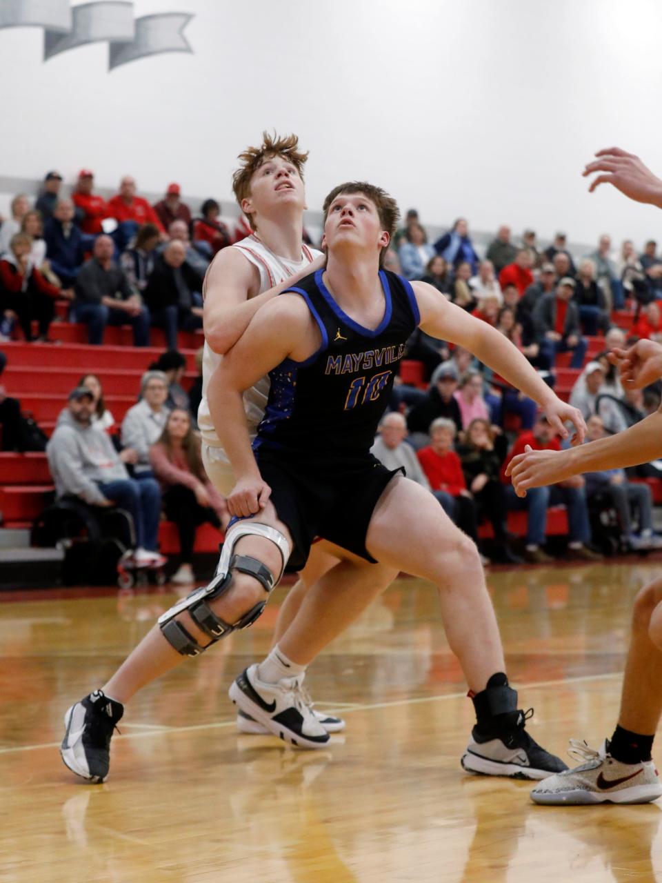 Coen Fink and Tyce Whiteman, left, fight for position on the block during Maysville's 66-52 win against host Sheridan on Tuesday night at Glen Hursey Gymnasium..