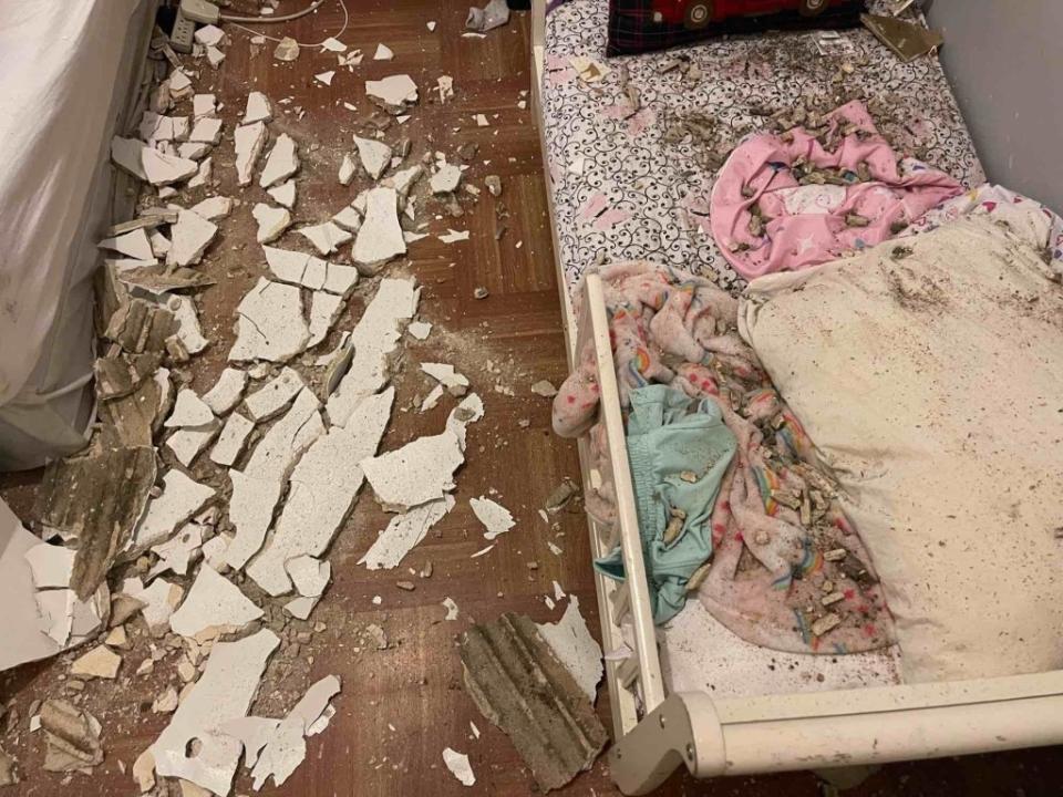 The squalid conditions are often dangerous to occupants — such as this ceiling that collapsed on a child’s bed at 709 West 170th Street. 709 West 170th Street Tenants Association