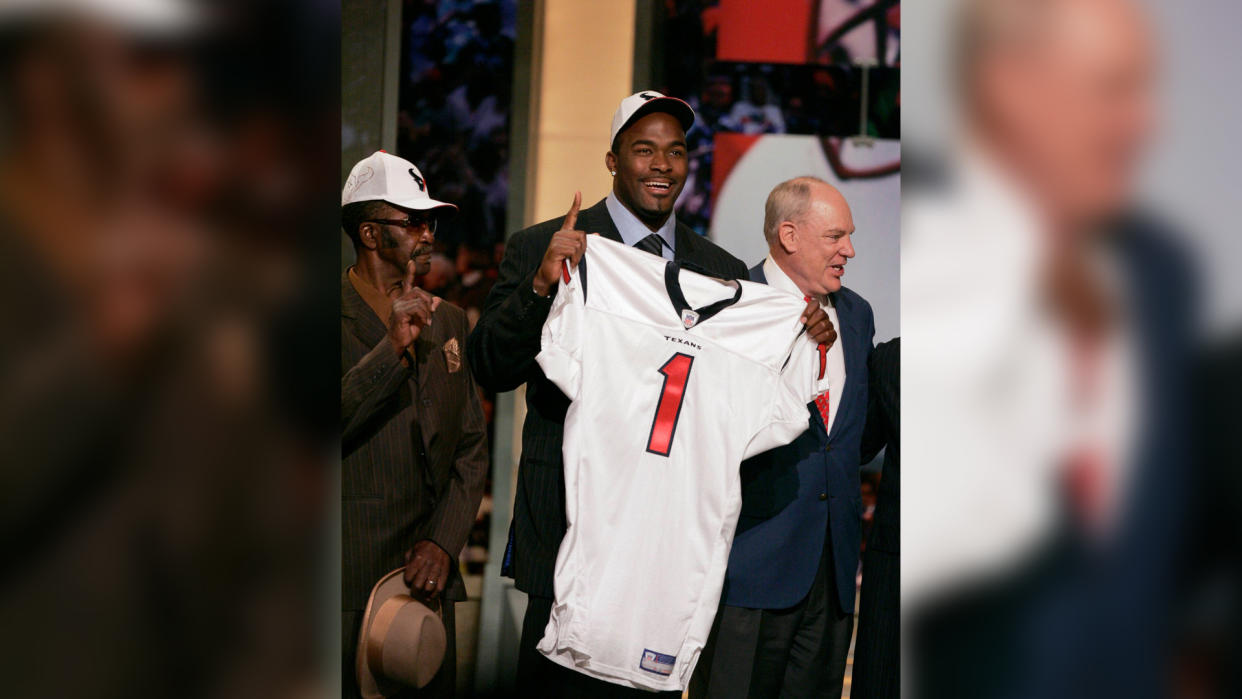 Mandatory Credit: Photo by Julie Jacobson/AP/Shutterstock (6032826a)Mario Williams RAW FILE** Mario Williams of North Carolina State holds up a Houston Texans jersey after being picked by the team as the No.