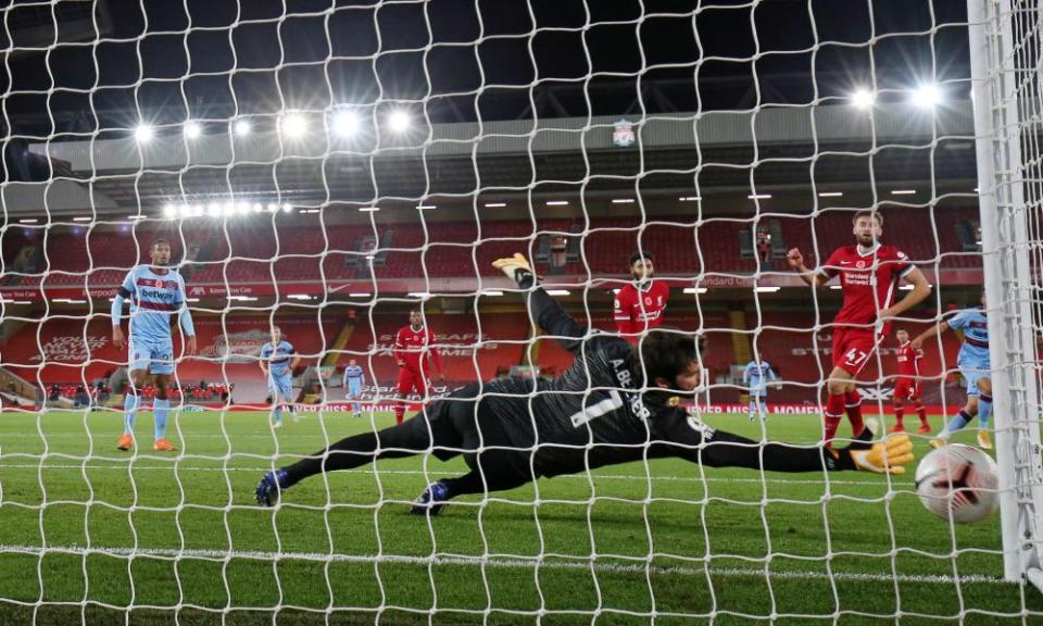 Alisson lunges to his right in vain as Pablo Fornals opens the scoring.