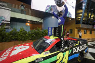 William Byron celebrates after winning a NASCAR Cup Series auto race, Sunday, Feb. 28, 2021, in Homestead, Fla. (AP Photo/Wilfredo Lee)