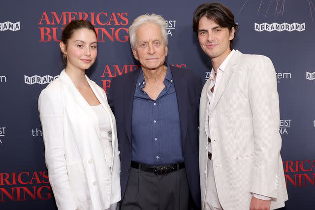 <p>Michael Loccisano/Getty</p> ichael Douglas and his children Carys Zeta Douglas and Dylan Michael Douglas.