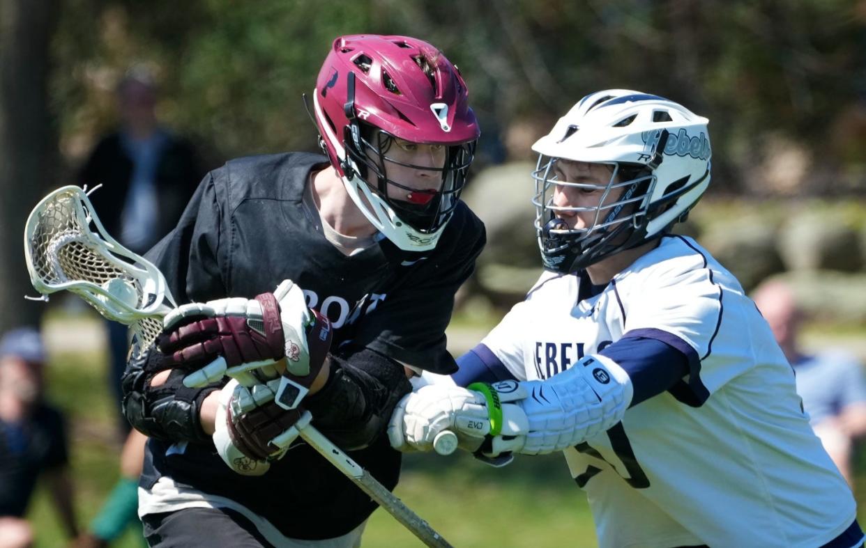 South Kingstown Rebels host the Prout Crusaders in boys lacrosse on April 15, 2024.