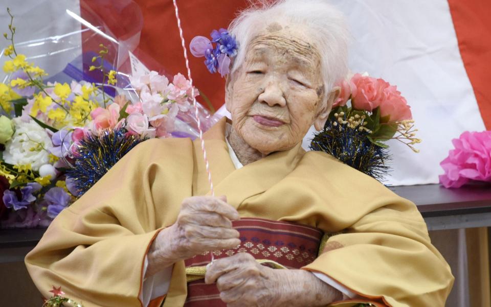 Kane Tanaka, born in 1903, celebrating her 117th birthday in 2020. She is the oldest living person - KYODO/REUTERS