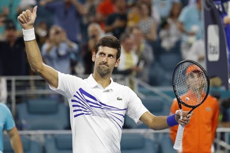 Mar 24, 2019; Miami Gardens, FL, USA; Novak Djokovic of Serbia salutes the crowd after his match against Federico Delbonis of Argentina (not pictured) in the third round of the Miami Open at Miami Open Tennis Complex. Mandatory Credit: Geoff Burke-USA TODAY Sports