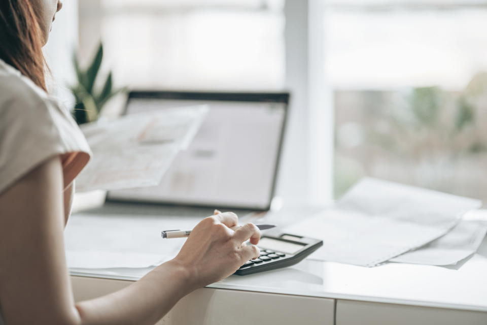 A woman doing taxes