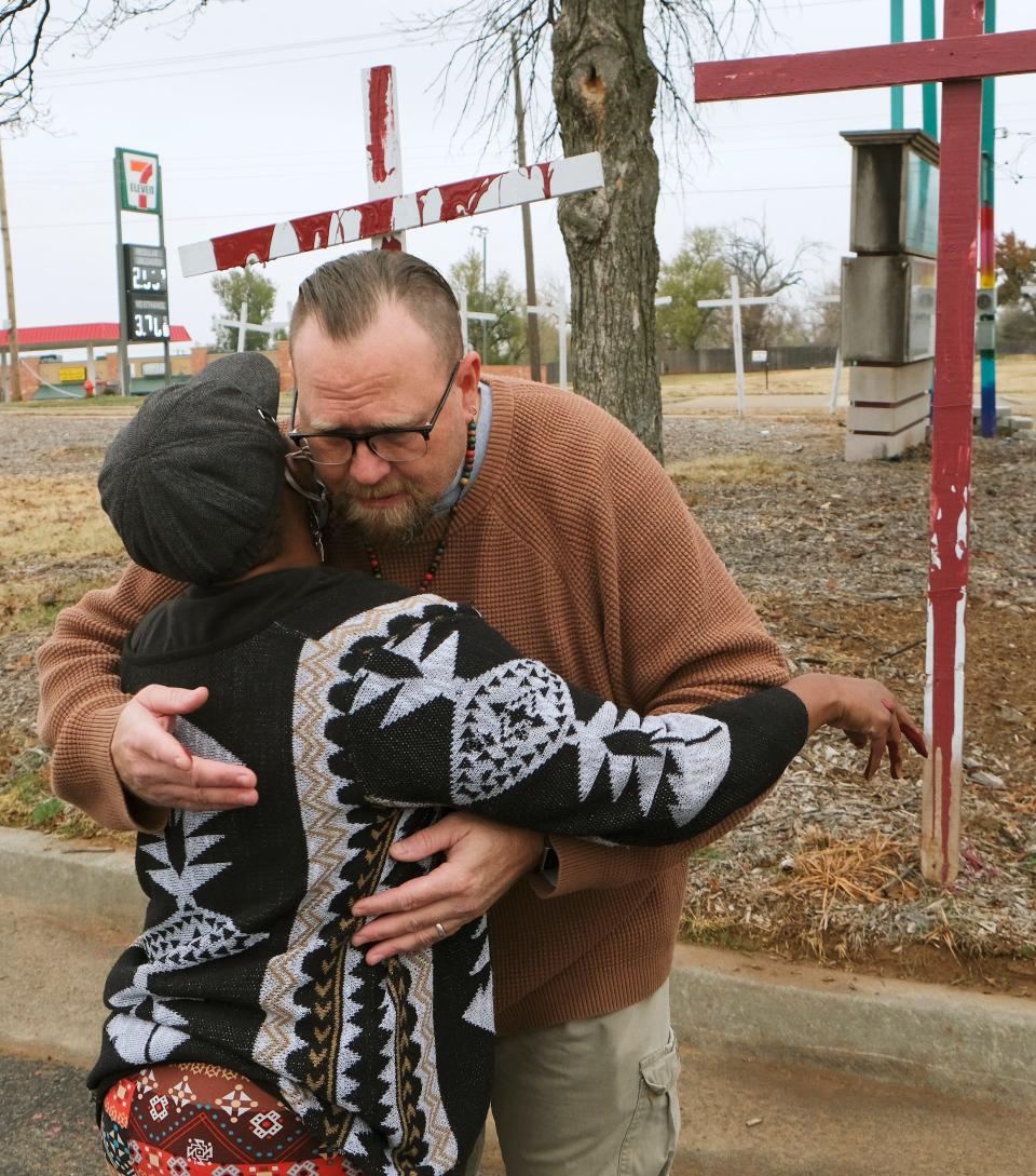 Ebony Guesby hugs the Rev. Bo Ireland who led the "Red Prayer Vigil" at The Lazarus Community at Clark United Methodist Church, 5808 NW 23 St. in Oklahoma City, following Thursday's execution of Phillip Hancock earlier in the day.