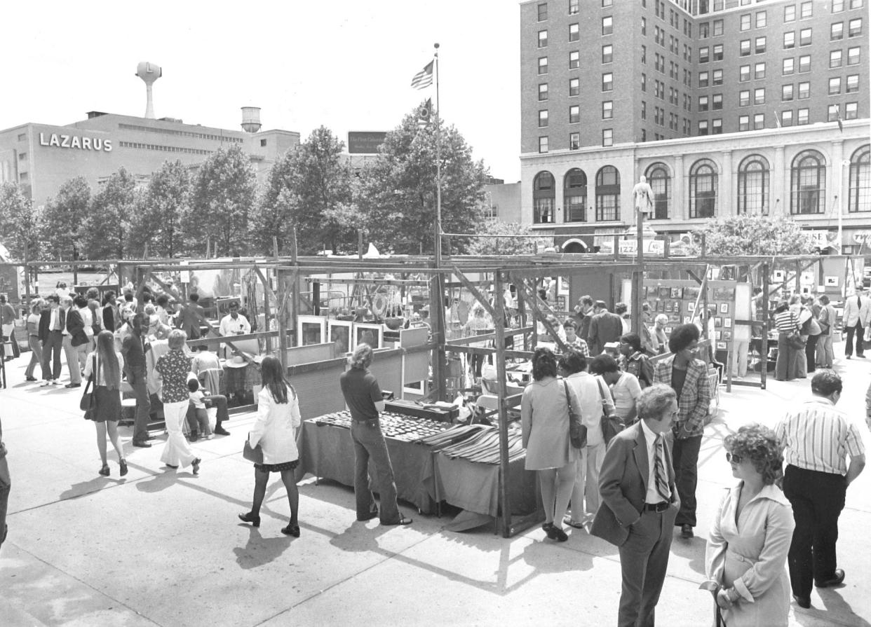 In 1974, Columbus Arts Festival visitors could find crocheted handbags, hanging terrariums, metal mobiles and more. Also seen are two Columbus institutions lost to time: Lazarus department store, left, and the Neil House hotel, right.