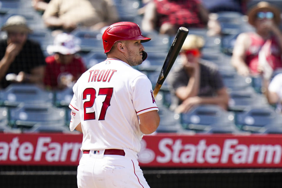 Los Angeles Angels' Mike Trout heads back to the dugout after striking out during the sixth inning of a baseball game against the Houston Astros, Sunday, Sept. 4, 2022, in Anaheim, Calif. (AP Photo/Jae C. Hong)