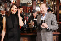 <p><i>The King's Man</i> stars Gemma Arterton and Ralph Fiennes raise a glass at the opening of 'The King's Man Pub' at The Crown in celebration of the movie's world premiere on Dec. 6 in London. </p>