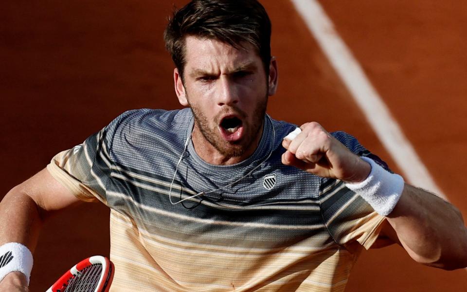 Britain's Cameron Norrie celebrates after winning his second round match against France's Lucas Pouille - Cameron Norrie shows new hard-nosed edge with victory despite French Open boos - Reuters/Benoit Tessier