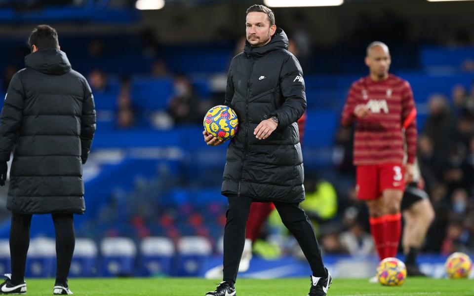 Pepijn Lijnders, Assistant Coach of Liverpool looks on ahead of the Premier League match between Chelsea and Liverpool at Stamford Bridge on January 02, 2022 in London, England. - Shaun Botterill/Getty Images
