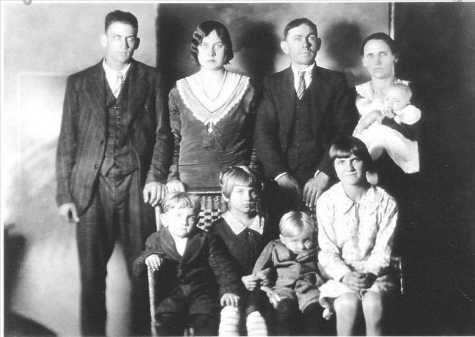 A portrait of the Lawson family of Germanton, N.C., taken in December 1929, days before patriarch Charlie Lawson murdered all but the eldest son (Arthur) in his family. Clockwise from top left: Arthur (16), Marie (17), Charles (43), Fannie (37) holding baby Mary Lou, Carrie (12), Raymond (2), Maybell (7) and James (4).