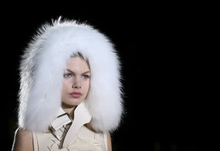 A model presents a creation from the Ermanno Scervino Autumn/Winter 2016 women's collection during Milan Fashion Week, Italy, February 27, 2016. REUTERS/Stefano Rellandini