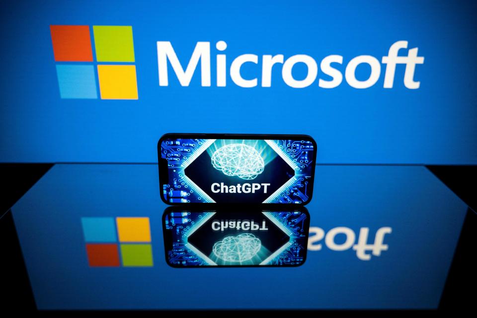 This picture taken on January 23, 2023 in Toulouse, southwestern France, shows screens displaying the logos of Microsoft and ChatGPT, a conversational artificial intelligence application software developed by OpenAI. - Microsoft extended on January 23 its partnership with with OpenAI, the research lab and creator of ChatGPT, a conversational artificial intelligence application software, in a 