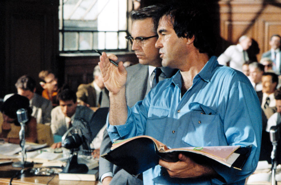 Director Oliver Stone with Kevin Costner on the set of 'JFK.'