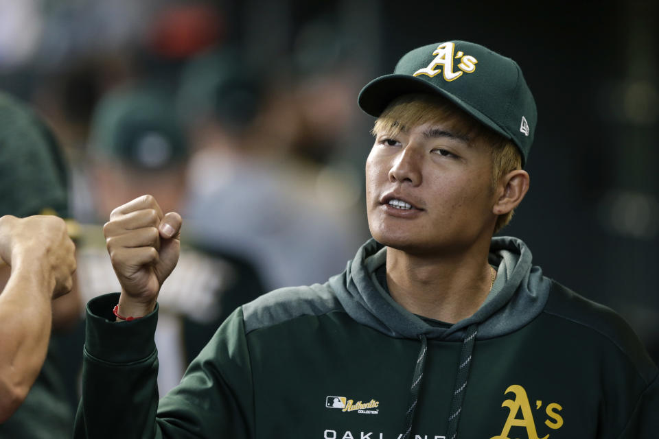 HOUSTON, TX - JULY 24:  Wei-Chung Wang #61 of the Oakland Athletics greets teammates before the game against the Houston Astros at Minute Maid Park on July 24, 2019 in Houston, Texas.  (Photo by Tim Warner/Getty Images)