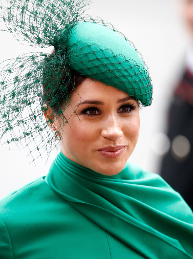 Meghan, Duchess of Sussex wears a green dress and matching hat at the Commonwealth Day Service 2020 at Westminster Abbey on March 9, 2020 in London, England.