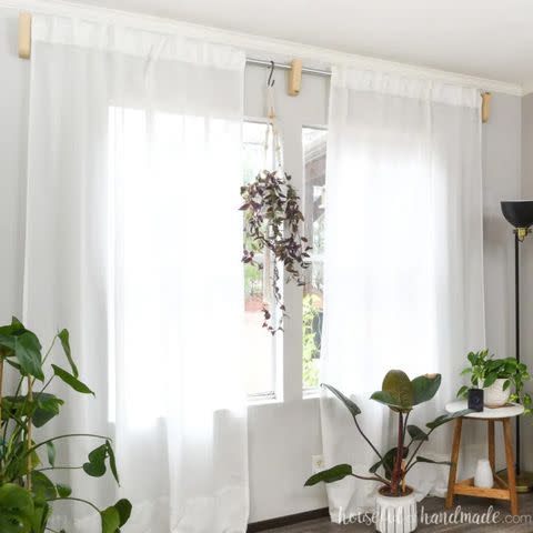 <p>Design by <a href="https://housefulofhandmade.com/wood-curtain-rod-brackets/" data-component="link" data-source="inlineLink" data-type="externalLink" data-ordinal="1">Houseful of Handmade</a></p>