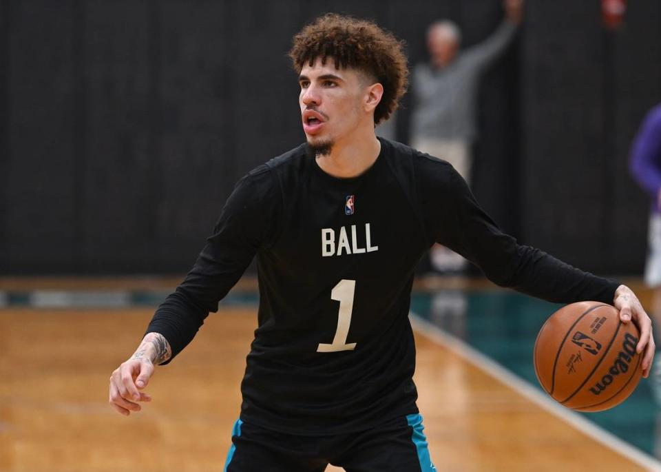 Charlotte Hornets guard LaMelo Ball dribbles prior to dropping back and releasing a jump shot during an after practice shoot around on Tuesday, September 27, 2022.