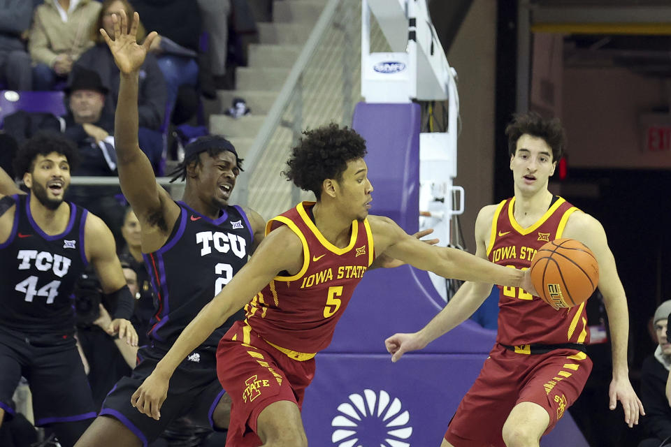 Iowa State guard Curtis Jones (5) steals the ball from TCU forward Emanuel Miller (2) in the second half of an NCAA basketball game Saturday, Jan. 20, 2024, in Fort Worth, Texas. (AP Photo/Richard W. Rodriguez)