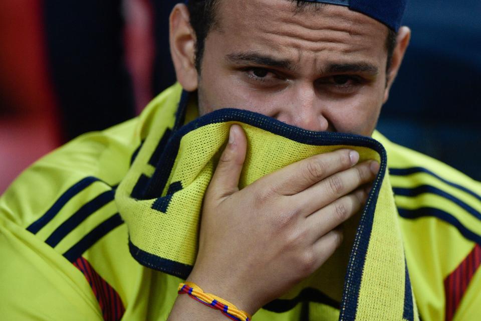 <p>A Colombia fan cries after his team lost the penalty shootout at the end of the Russia 2018 World Cup round of 16 football match between Colombia and England at the Spartak Stadium in Moscow on July 3, 2018. (Photo by Juan Mabromata / AFP) </p>