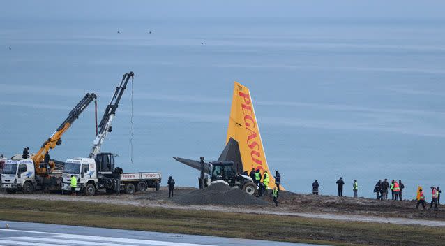 Rescuers evacuated everyone via the rear exit of the aircraft. Photo: Getty