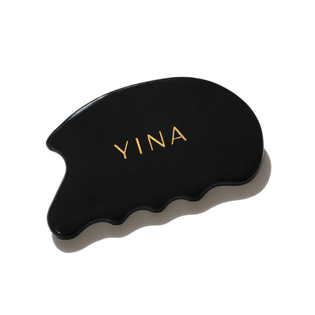 <p><a href="https://go.redirectingat.com?id=74968X1596630&url=https%3A%2F%2Fyina.co%2Fproducts%2Fbian-stone-gua-sha&sref=https%3A%2F%2F" rel="nofollow noopener" target="_blank" data-ylk="slk:Shop Now;elm:context_link;itc:0;sec:content-canvas" class="link rapid-noclick-resp">Shop Now</a></p><p>Bian Stone Gua Sha</p><p>yina.co</p><p>$85.00</p>