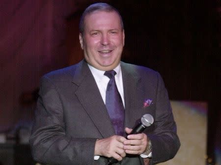 Singer Frank Sinatra Jr. smiles after performing at the 46th annual Thalians Ball in Los Angeles, California, in this October 13, 2001, file photo. REUTERS/Jim Ruymen/Files