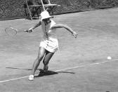 FILE - In this April 25, 1969, file photo, Julie Heldman, of Los Angeles, Calif., competes against second-seeded Lesley Turner Bowrey, of Australia, in the Rome International Open Tennis Tournament in Rome. Heldman and eight other women risked their tennis careers 50 years ago when they signed $1 contracts to launch a new women's circuit. (AP Photo/Claudio Luffoli, File)
