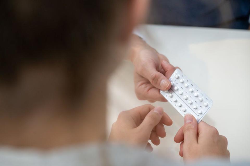 production 12 december 2023, bavaria, planegg gynecologist stephanie eder gives a young patient the contraceptive pill in her gynecologists office photo stefan puchnerdpa photo by stefan puchnerpicture alliance via getty images