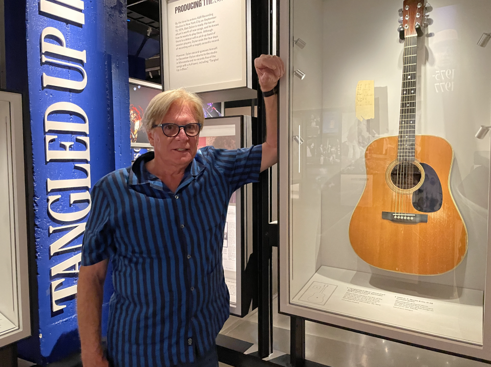 Kevin Odegard at the Bob Dylan Center with the guitar he played on “Blood on the Tracks” - Credit: Chris Willman/Variety