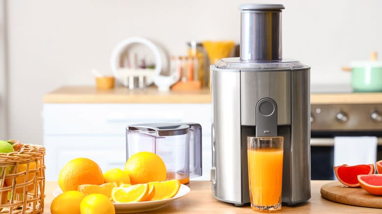 juicer oranges in kitchen