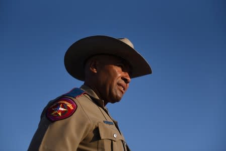 State troopers and other emergency personnel are seen following a shooting in Odessa