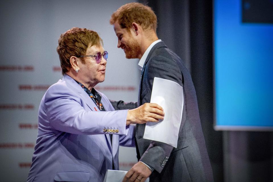 Elton and Harry were seen embracing at the launch. Photo: Getty