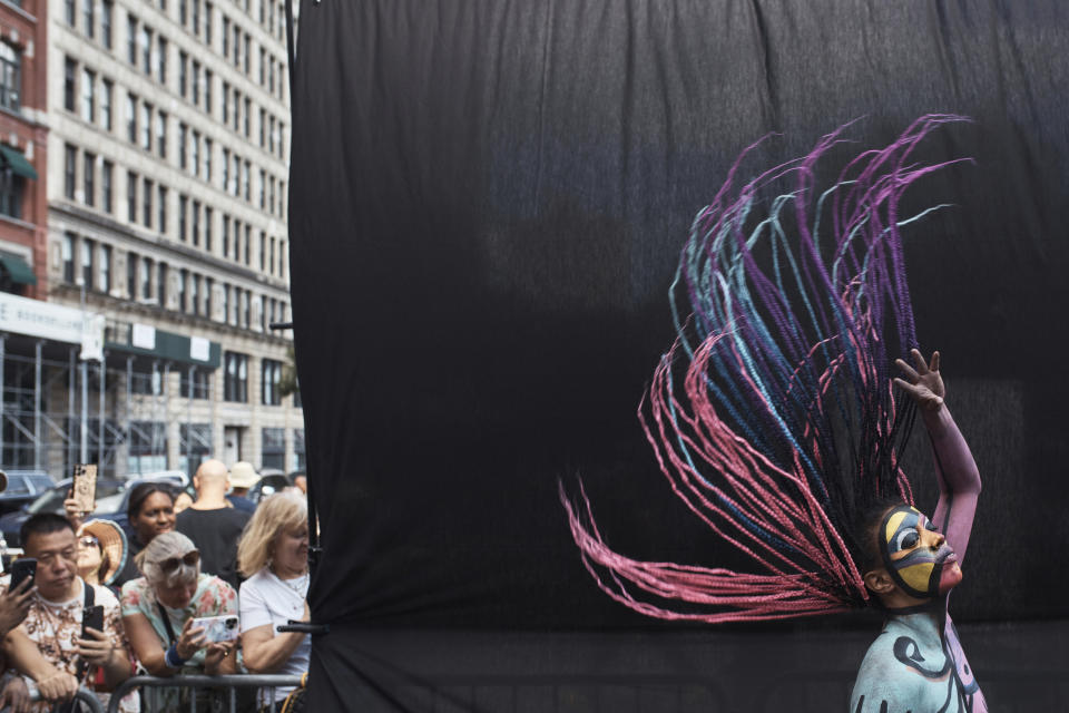 A model painted by an artist poses during at Human Connection Arts Annual NYC Bodypainting Day in Union Square Park on Sunday, July 23, 2023, in New York. (AP Photo/Andres Kudacki)