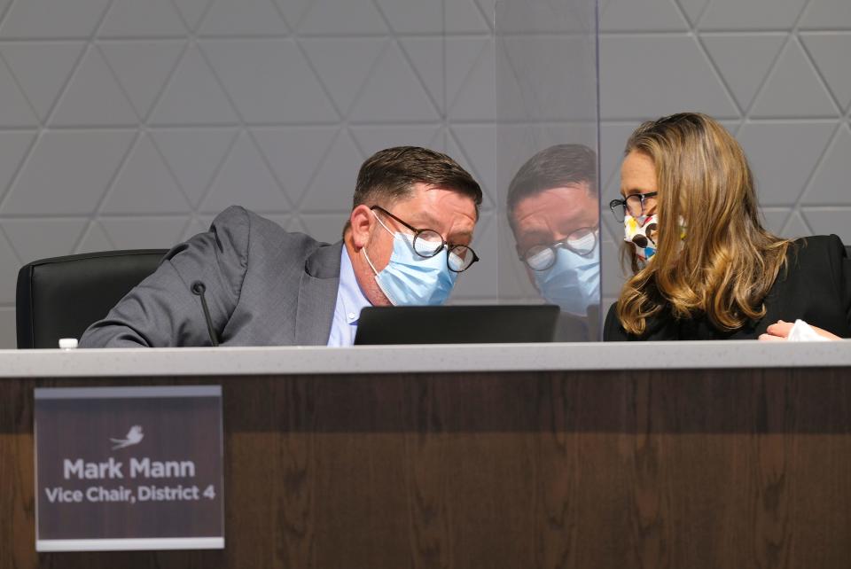 Mark Mann and Paula Lweis during the Oklahoma City Public School Board meeting Monday, April 12, 2021.