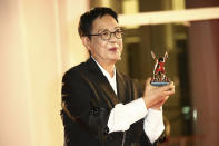 Director Ann Hui holds her Golden Lion award for Lifetime Achievement during the 77th edition of the Venice Film Festival in Venice, Italy, Tuesday, Sept. 8, 2020. (Photo by Joel C Ryan/Invision/AP)