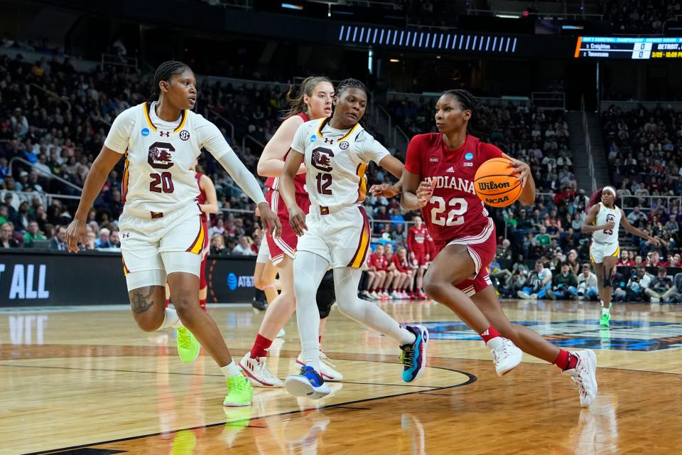 Indiana guard Chloe Moore-McNeil drives against South Carolina's MiLaysia Fulwiley (12) and Sania Feagin (20) in the first half on Friday.