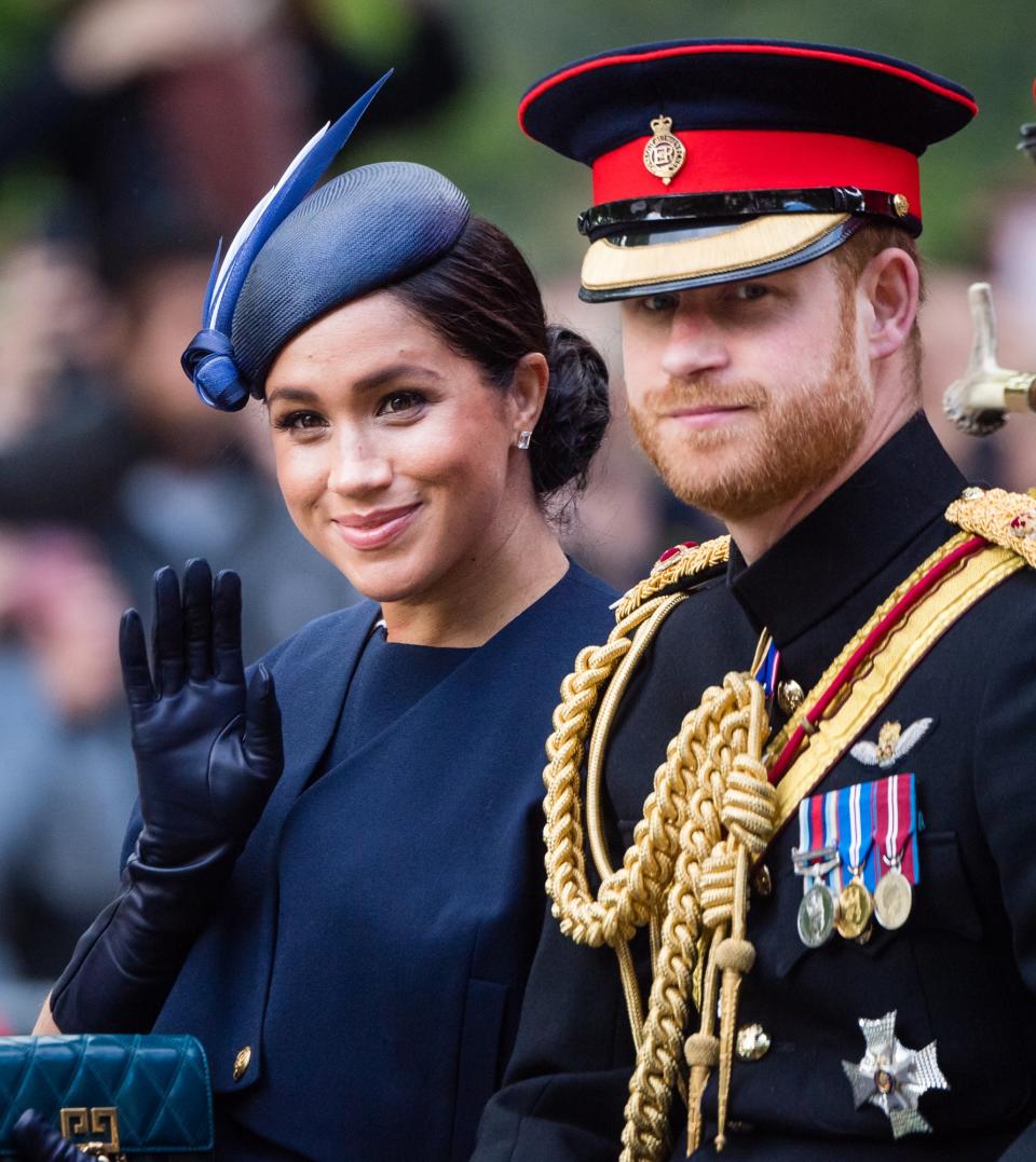 While Prince Harry did not take a formal paternity leave and continued to step out for engagements, Meghan mostly remained out of the spotlight to focus on motherhood. Her <a href="https://people.com/royals/kate-middleton-meghan-markle-arrive-trooping-the-colour/" rel="nofollow noopener" target="_blank" data-ylk="slk:first post-baby appearance came at Trooping the Colour;elm:context_link;itc:0;sec:content-canvas" class="link ">first post-baby appearance came at Trooping the Colour</a> in June, the Queen's public birthday celebration. She rode in a carriage alongside her husband, with Kate Middleton and Camilla, Duchess of Cornwall, across from them.