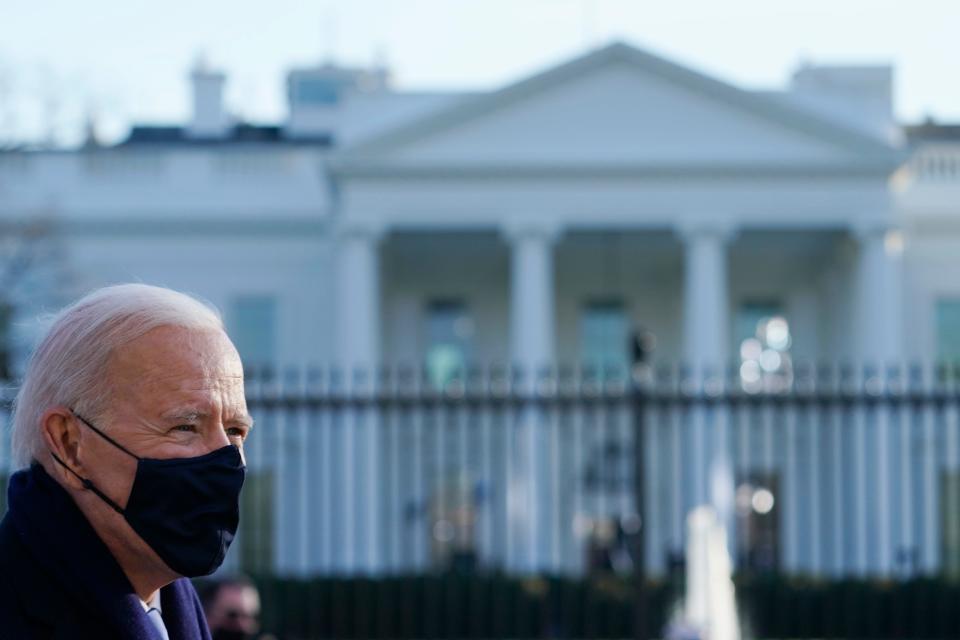 U.S. President Joe Biden walks the abbreviated parade route in front of the White House after Biden's inauguration on January 20, 2021 in Washington, DC.